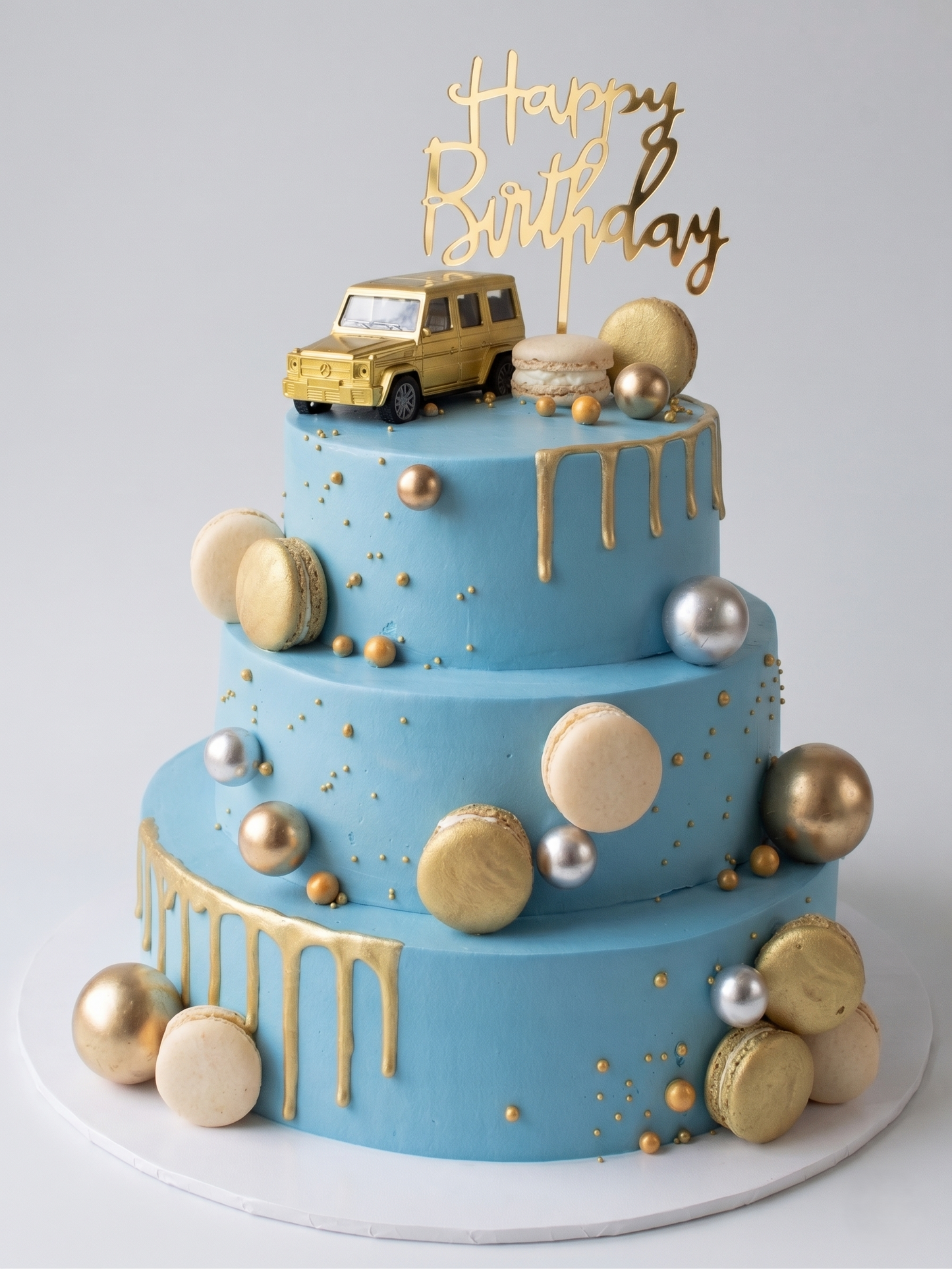 B-584 3 Tier Blue Cake with Gold Dripping