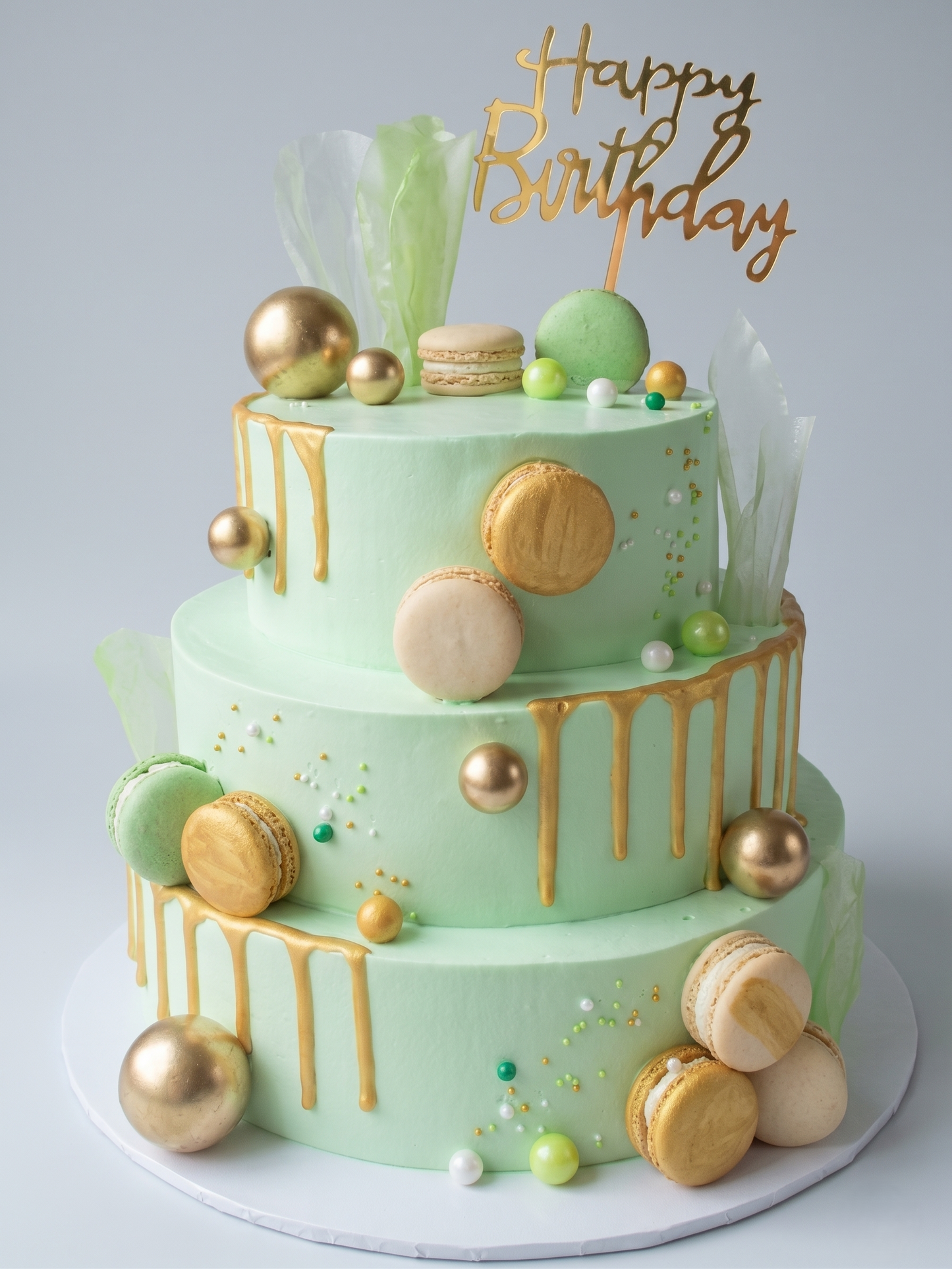 B-582 3 Tier Green and Gold Drip Cake