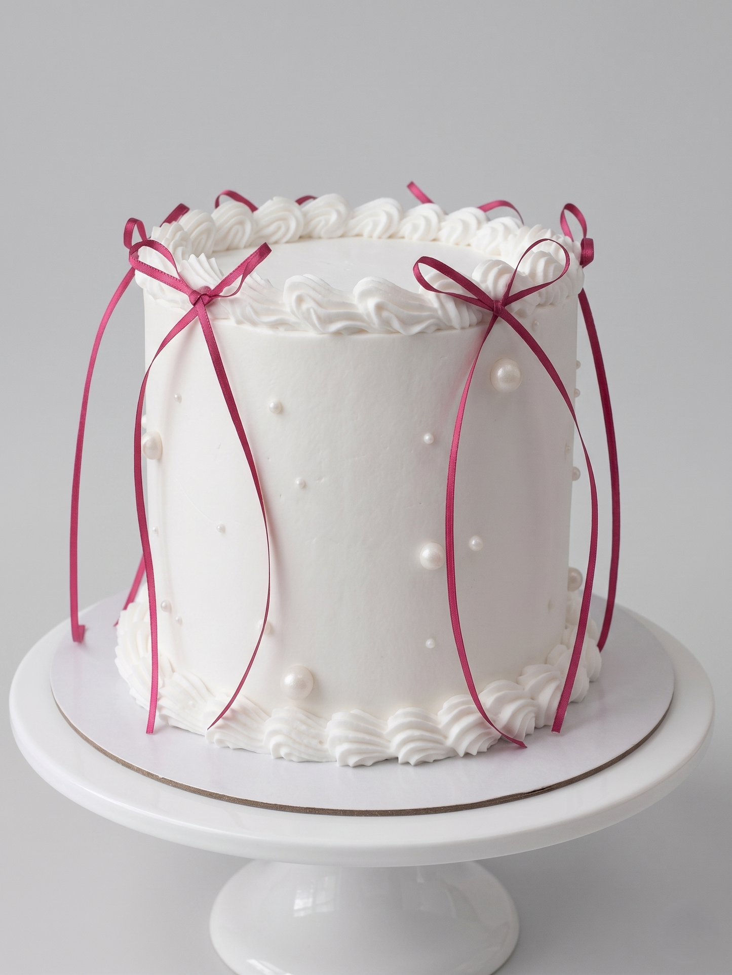 BA-008 White Pearls with Red Ribbon Bows