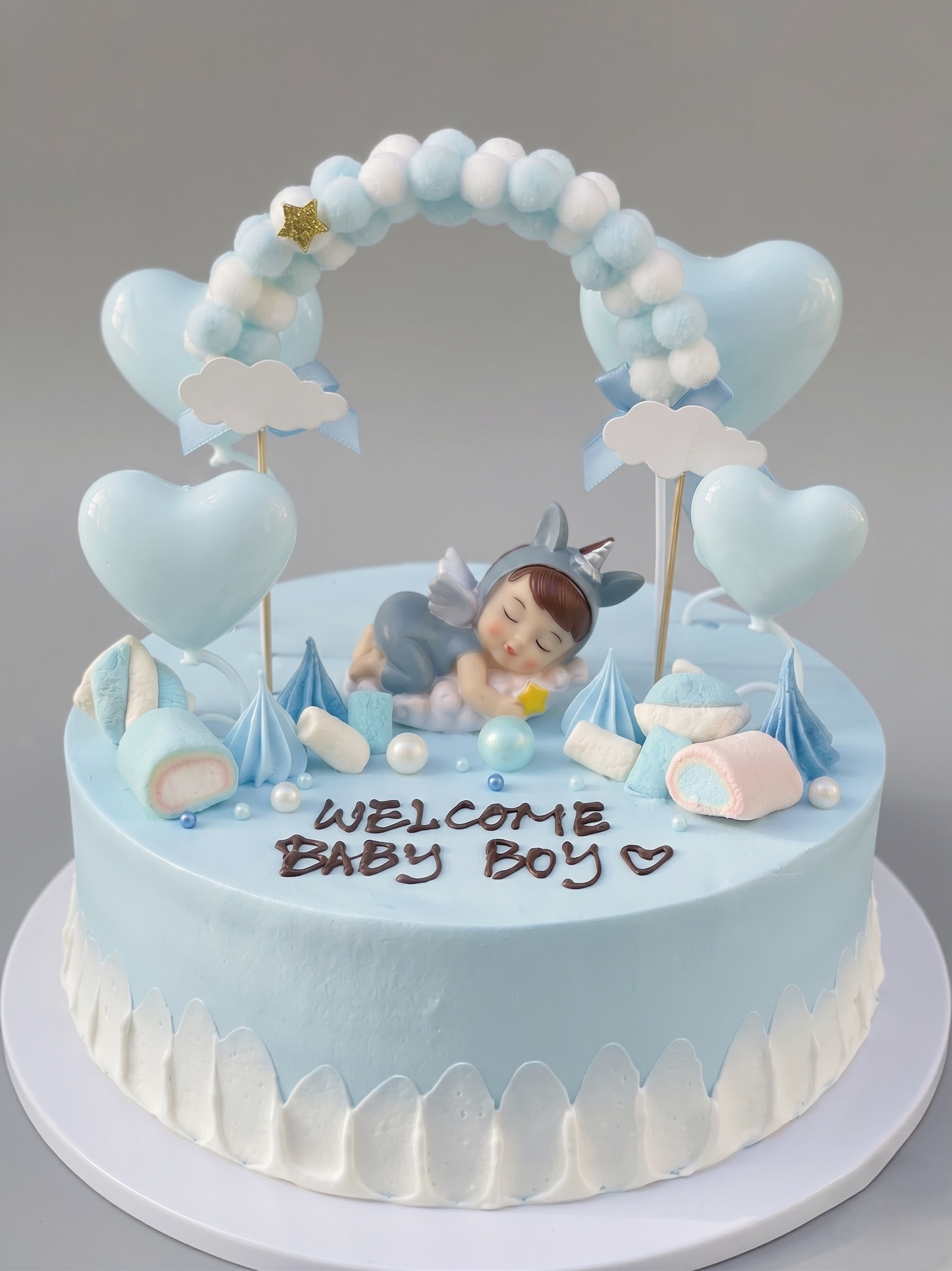 BS-129 Sleeping Baby Boy under Pon Pon Arch