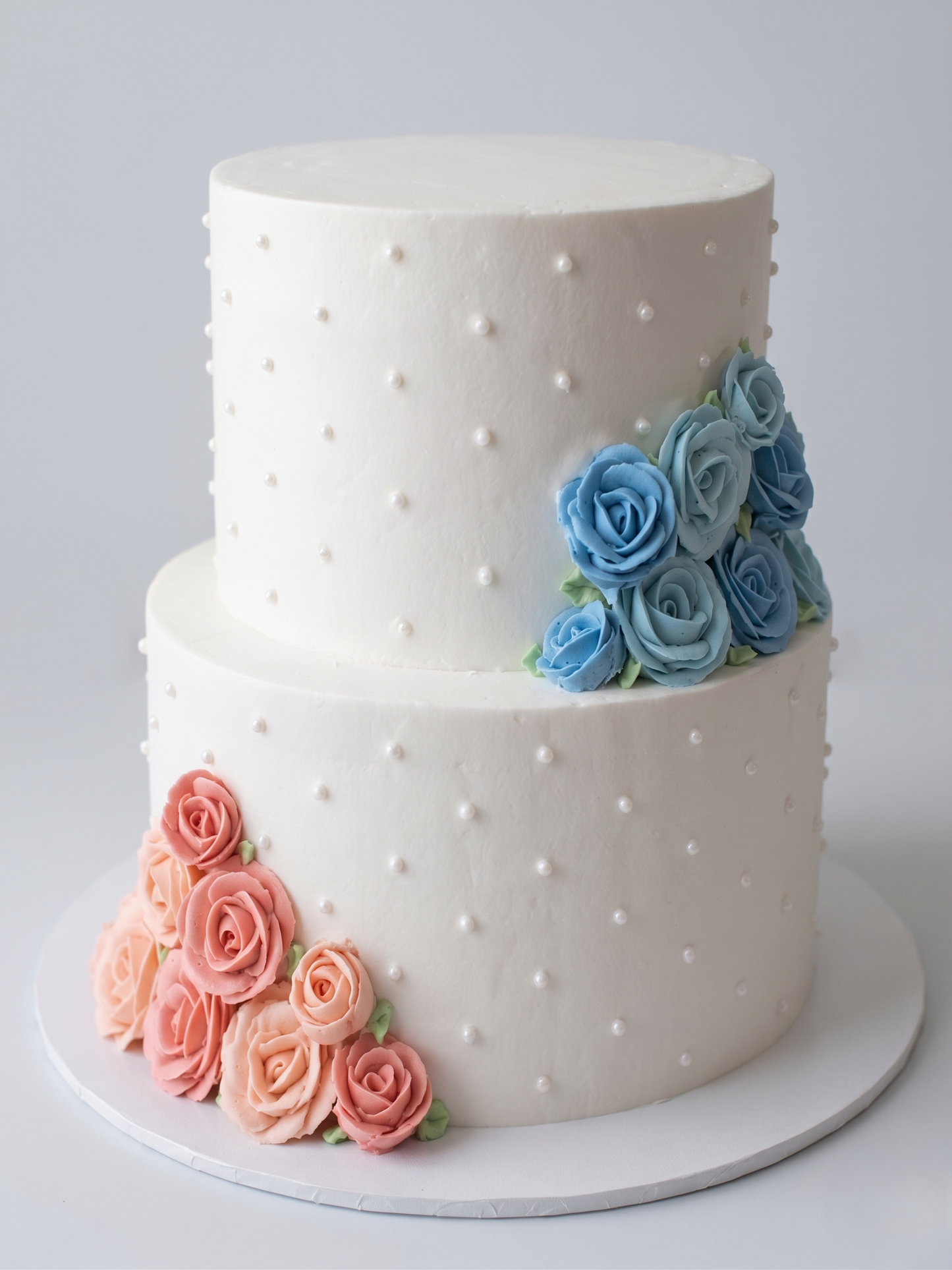 BS-292 2 Tier Double Height Pink & Blue Roses Cake
