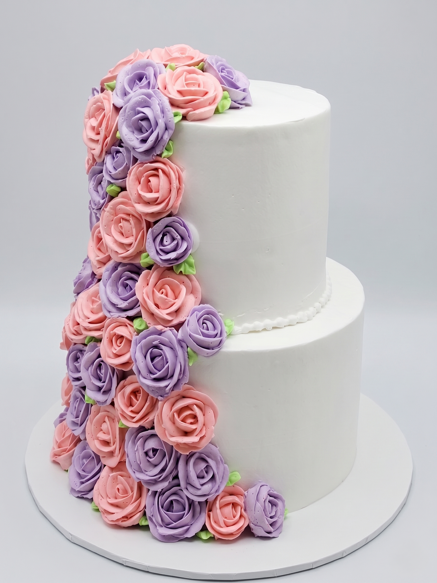 WC-241 2 Tier Double Height Cascading Pink & Purple Roses Cake